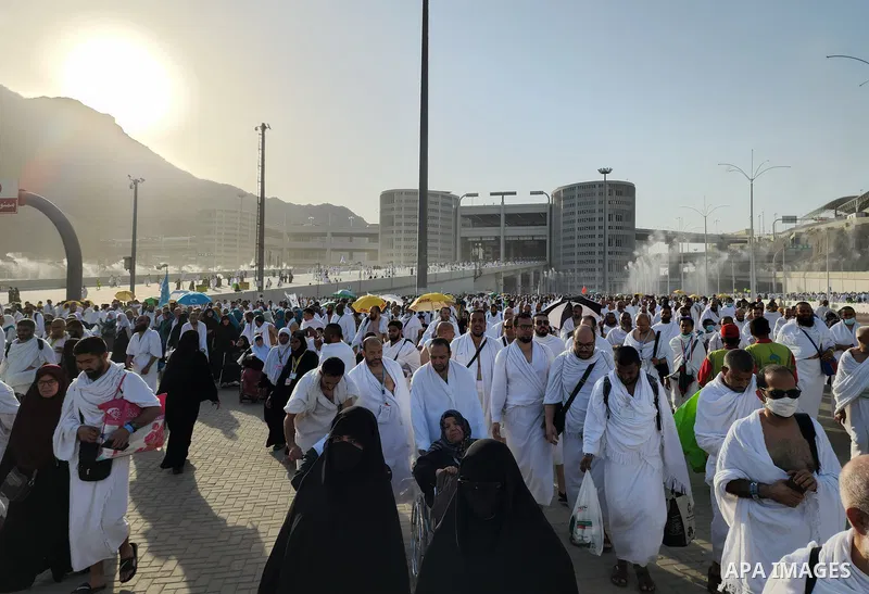 Muslim worshippers make thier way to cast stones as part of a symbolic stoning of the devil ritual, during the Hajj pilgrimage in Mina, near Saudi Arabia's holy city of Mecca on July 09, 2022. From first light, small gro...