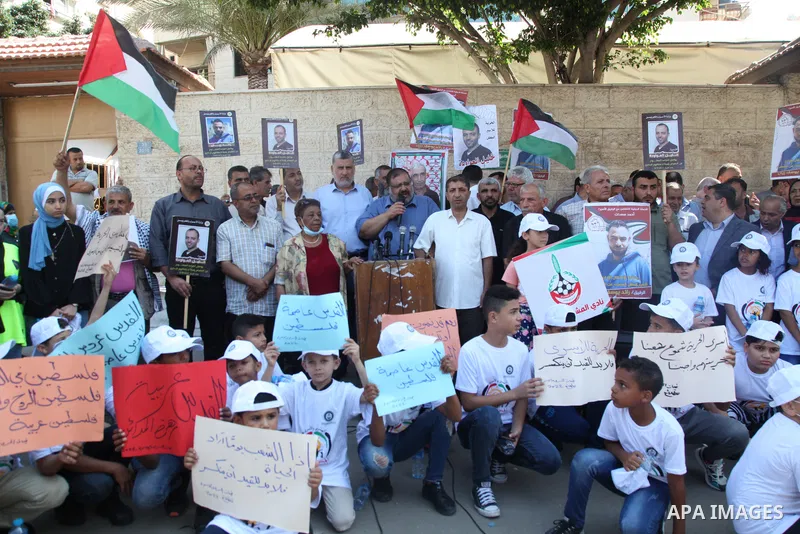 Palestinians take part in a protest to show solidarity with prisoners held in Israeli jails, in front of Red cross office in Gaza city, on July 18, 2022. According to the latest figures from Addameer, the Palestinian Pri...