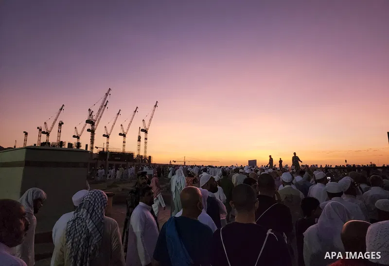 Muslim pilgrims visits Al-Baqi cemetery next to the Prophet Mohammed's mosque and a place of great reverence for Muslims in Saudi Arabia's holy city of Medina, Islam's second holiest city on July 18, 2022. Al-Baqi cemete...