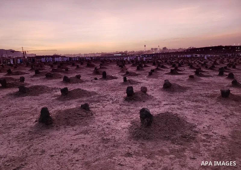 Muslim pilgrims visits Al-Baqi cemetery next to the Prophet Mohammed's mosque and a place of great reverence for Muslims in Saudi Arabia's holy city of Medina, Islam's second holiest city on July 18, 2022. Al-Baqi cemete...