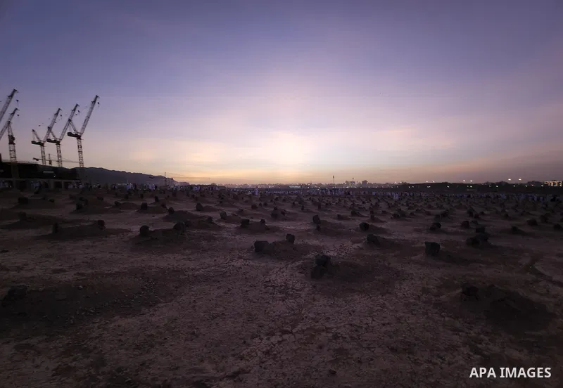 Muslim pilgrims visits Al-Baqi cemetery next to the Prophet Mohammed's mosque and a place of great reverence for Muslims in Saudi Arabia's holy city of Medina, Islam's second holiest city on July 18, 2022. Al-Baqi cemete...