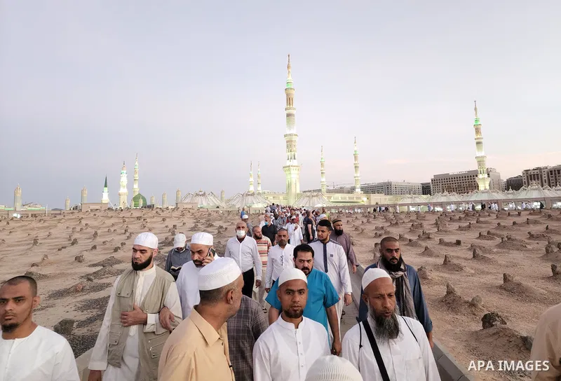 Muslim pilgrims visits Al-Baqi cemetery next to the Prophet Mohammed's mosque and a place of great reverence for Muslims in Saudi Arabia's holy city of Medina, Islam's second holiest city on July 18, 2022. Al-Baqi cemete...