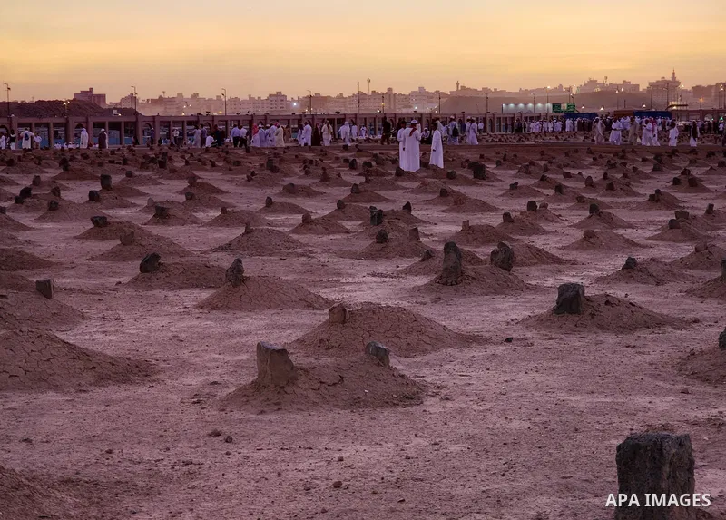 Muslim pilgrims visits Al-Baqi cemetery next to the Prophet Mohammed's mosque and a place of great reverence for Muslims in Saudi Arabia's holy city of Medina, Islam's second holiest city on July 18, 2022. Al-Baqi cemete...