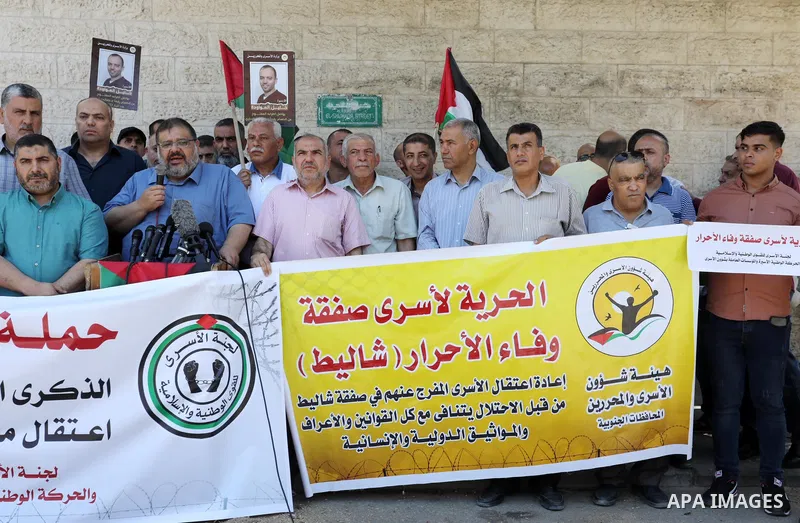 Palestinians take part in a protest to show solidarity with prisoners on hunger strike held in Israeli jails, in front of Red cross office in Gaza city, on June 19, 2022. Six Palestinian freedom fighters in Israeli priso...