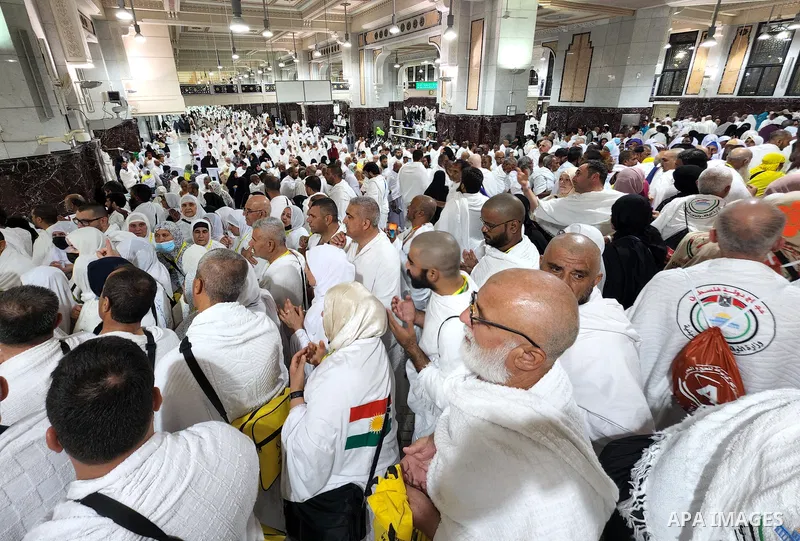 Muslim pilgrims walk during annual Hajj pilgrimage in the holy Saudi city of Mecca on June 22, 2022. Annual Saudi Arabia welcomed its first batch of hajj pilgrims since before the coronavirus pandemic, which prompted aut...