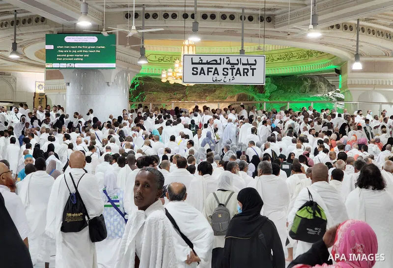 Muslim pilgrims walk during annual Hajj pilgrimage in the holy Saudi city of Mecca on June 22, 2022. Annual Saudi Arabia welcomed its first batch of hajj pilgrims since before the coronavirus pandemic, which prompted aut...