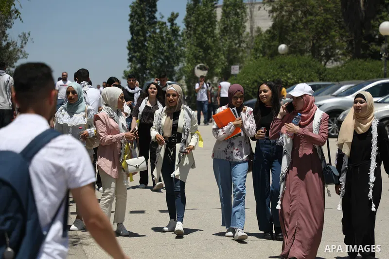 Palestinian students take part in student council elections at Birzeit University on the outskirts of Ramallah in the West Bank, on May 18, 2022. Photo by Wajed Nobani