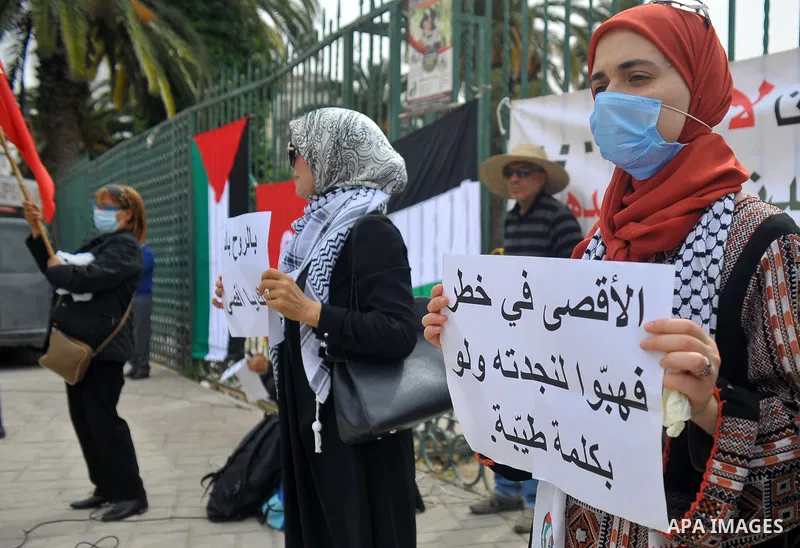 Tunisian protesters take part in a protest in support of Palestine and Al-Aqsa Mosque in Tunis, on April 27, 2022. Photo by Hasan Mrad