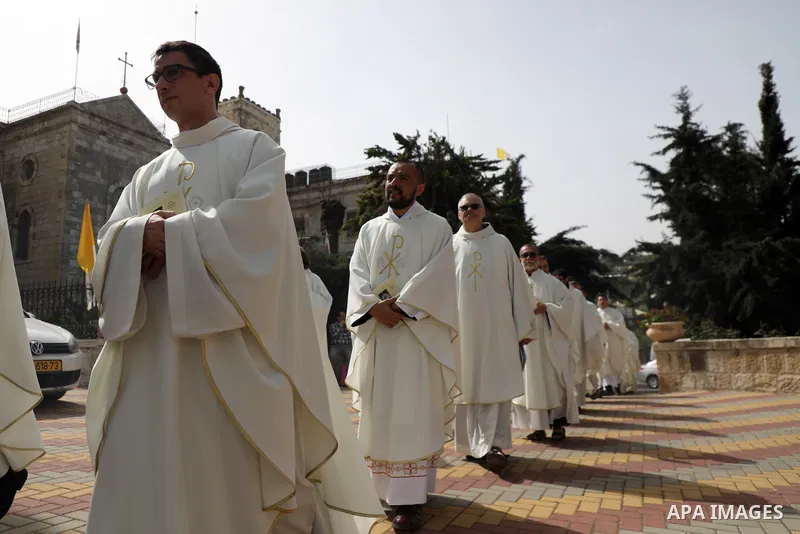 Christian Palestinians attend the Monday of the Angel mass (Feast of disciples of Jesus Simon and Cleopas) known as “Little Easter", in the monastery of the village of Al-Qubeiba northwest of Jerusalem, on April 18, 2022...