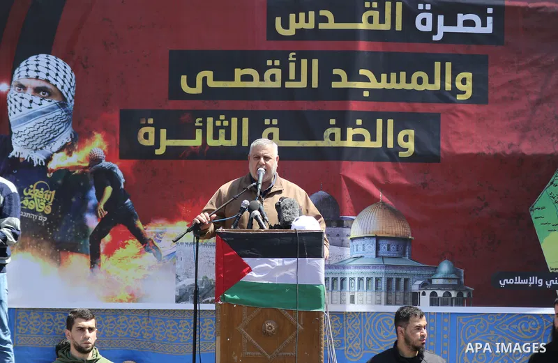 Supporters of the Palestinian Hamas and Islamic Jihad movements rally after Friday prayers in Gaza City on April 15, 2022, following clashes at Jerusalem's Aqsa mosque compound. - More than 150 people were wounded in fre...