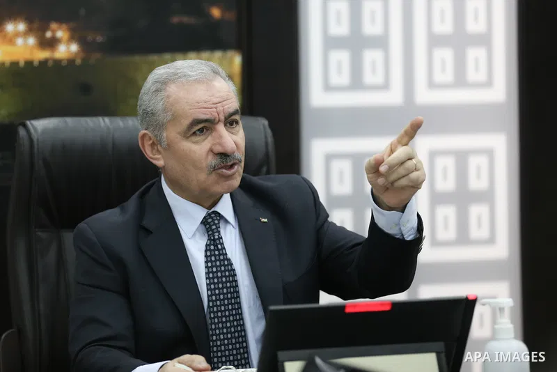 Palestinian Prime Minister Mohammed Ishtayeh chairs the weekly meeting of his government, in the West Bank city of Ramallah on January 31, 2022. Photo by Shadi Hatem