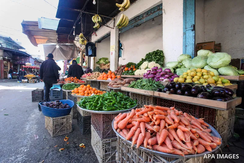 Palestinian sellers display their goods at al-Zawiya Market, in Gaza City on January 30 , 2022. The Gaza Strip is witnessing a marked increase in the prices of fruits and vegetables. Photo by Rahaf Aziz
