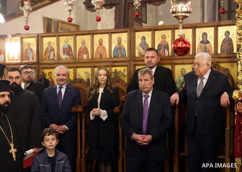 Palestinian President Mahmoud Abbas takes part in Midnight Mass for Christmas according to the Western calendar in the biblical city of Bethlehem, in the West Bank on January 6, 2023. Photo by Thaer Ganaim\ apaimages