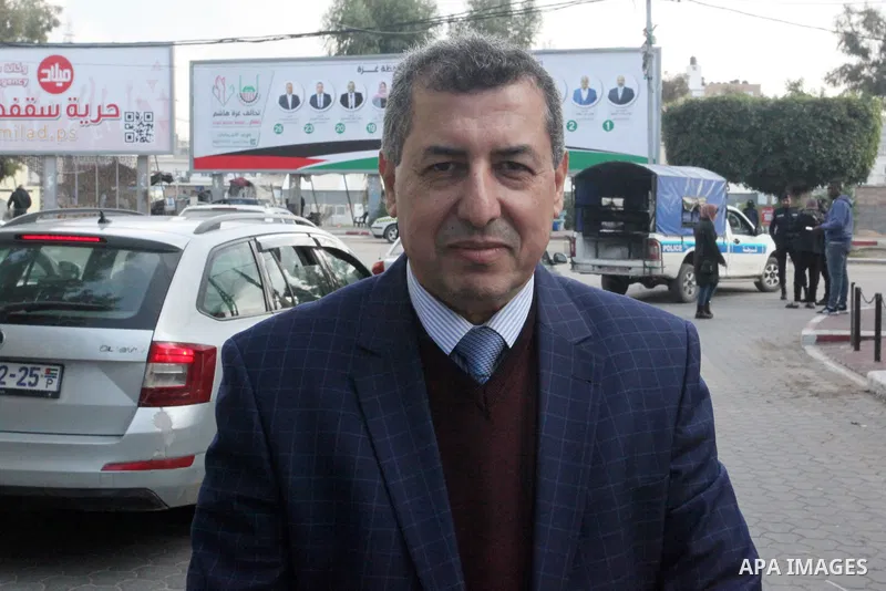 Mukhaimar Abu Saada, a university professor speaks during an interview in Gaza city on January 9, 2023. Israeli Minister of Finance, Bezalel Smotrich, to seize 139 million shekels from the Palestinian clearance tax. In 2...