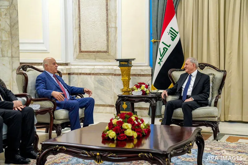 Iraqi President Abd al-Latif Rashid meets with the secretary of the Central Committee of the Fatah movement, head of the Supreme Council for Youth and Sports, Jibril Rajoub, at Baghdad Palace on January 9, 2023. Photo by...