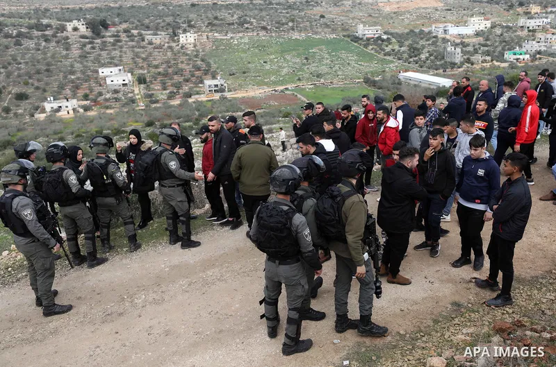 Clashes between Palestinian and Israeli forces following the demolition of a house in the village of Kafr al-Dik west of Salfit city in the occupied West Bank, on January 10, 2023. Photo by Wajed Nobani/APAimages