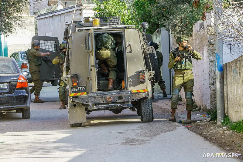 Israeli forces is seen during a raid in the West Bank village of Salem, near Nablus, on January 23, 2023. Photo by Mohammed Nasser\ apaimages