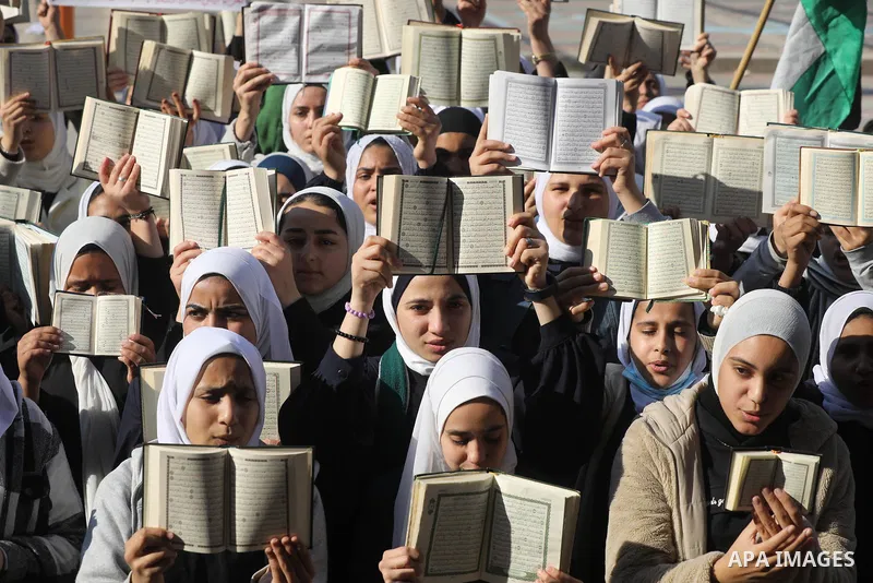 Palestinian students take part in a protest the burning of a copy of the Muslim holy book of Koran by a far-right politician Outside the Turkish Embassy in Stockholm at their school in Khan Yunis, in the southern Gaza St...
