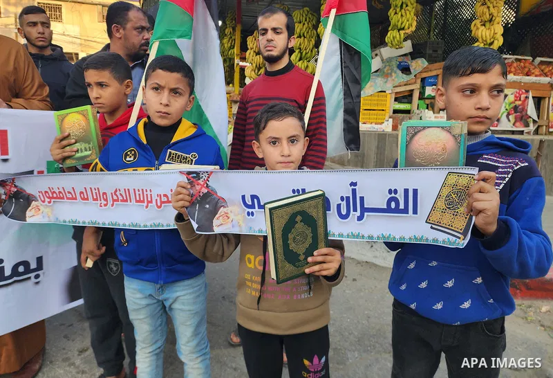 Palestinian take part in a protest the burning of a copy of the Muslim holy book of Koran by a far-right politician Outside the Turkish Embassy in Stockholm and the decision of the Israeli Minister of National Security,...