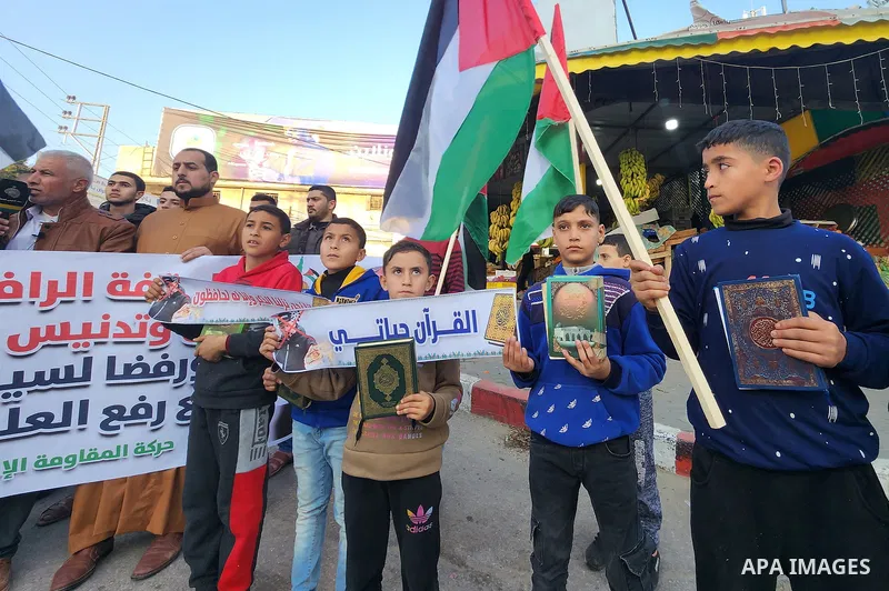 Palestinian take part in a protest the burning of a copy of the Muslim holy book of Koran by a far-right politician Outside the Turkish Embassy in Stockholm and the decision of the Israeli Minister of National Security,...