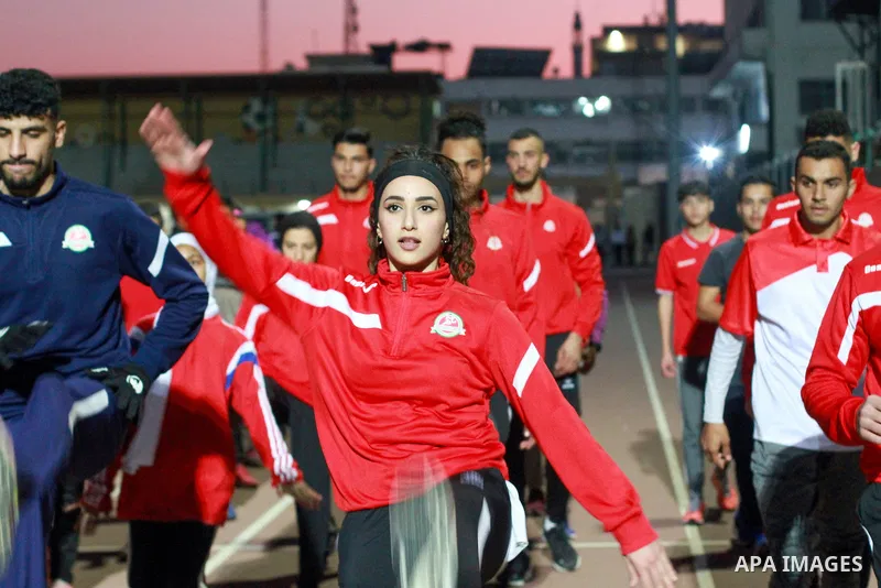 Palestinian athletes from the West Bank train in Yarmouk Stadium before the launch of the Palestine Athletics Championships, in Gaza city on January 24, 2023. Photo by Ali Hamad\ apaimages