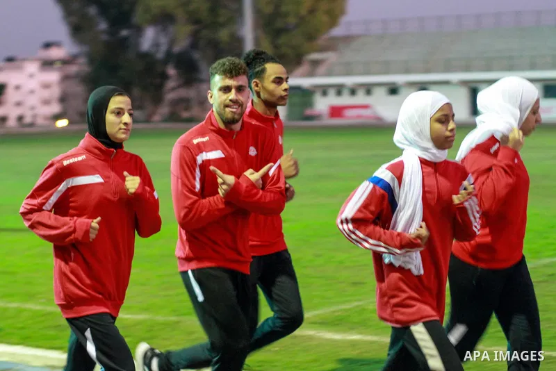 Palestinian athletes from the West Bank train in Yarmouk Stadium before the launch of the Palestine Athletics Championships, in Gaza city on January 24, 2023. Photo by Ali Hamad\ apaimages