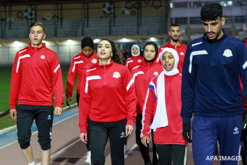 Palestinian athletes from the West Bank train in Yarmouk Stadium before the launch of the Palestine Athletics Championships, in Gaza city on January 24, 2023. Photo by Ali Hamad\ apaimages