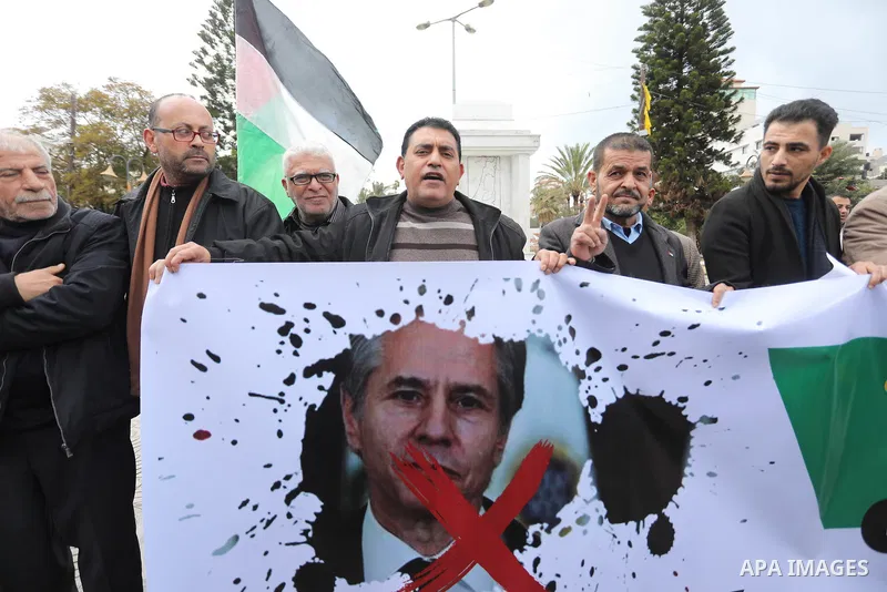 Palestinians take part in a protest against the visiting of US Secretary of State Antony Blinken to the region, in Gaza city on January 31, 2023. Blinken is on his final stop on a Middle East tour aimed at curbing the wo...