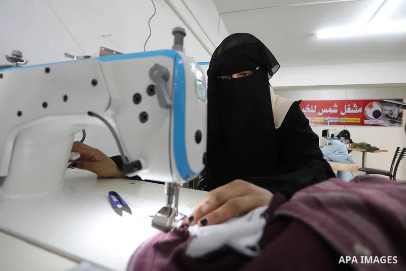 Palestinian women work in fashion design and sewing clothes in a sewing workshop, in Rafah in the southern of Gaza Strip on Feb. 05, 2023. As one of the most densely populated areas in the world, the Gaza Strip has been...