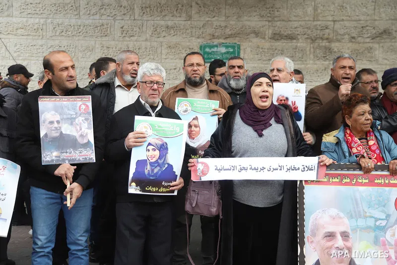 Palestinians take part in a protest in support prisoners in Israeli jails, in front of Red Cross office in Gaza city on February 06, 2023. Nearly 7,000 Palestinians were arrested by the Israeli forces in the Palestinian...