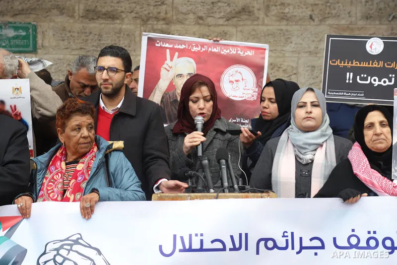 Palestinians take part in a protest in support prisoners in Israeli jails, in front of Red Cross office in Gaza city on February 06, 2023. Nearly 7,000 Palestinians were arrested by the Israeli forces in the Palestinian...