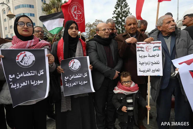 Palestinians take part in a rally in solidarity with Turkey and Syria following a deadly earthquake, in Gaza city on February 09, 2023. Turkey's death toll has risen to 12,873 overnight, from 12,391 late on Wednesday, th...