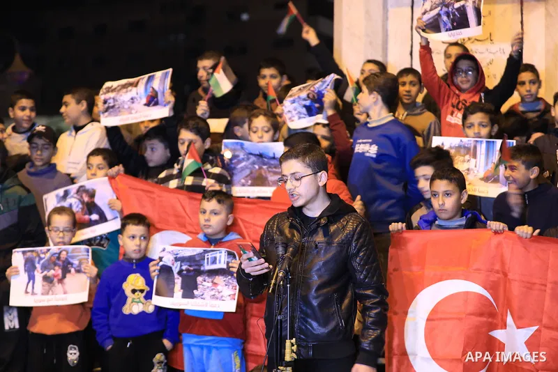 Palestinian children attend a gathering in solidarity with the people of Turkey and Syria following a devastating earthquake, in Gaza city on Feb. 09, 2023. A 7.8-magnitude earthquake hit Turkey and Syria on February 6,...