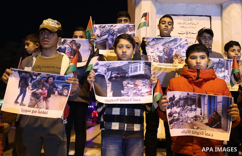Palestinian children attend a gathering in solidarity with the people of Turkey and Syria following a devastating earthquake, in Gaza city on Feb. 09, 2023. A 7.8-magnitude earthquake hit Turkey and Syria on February 6,...