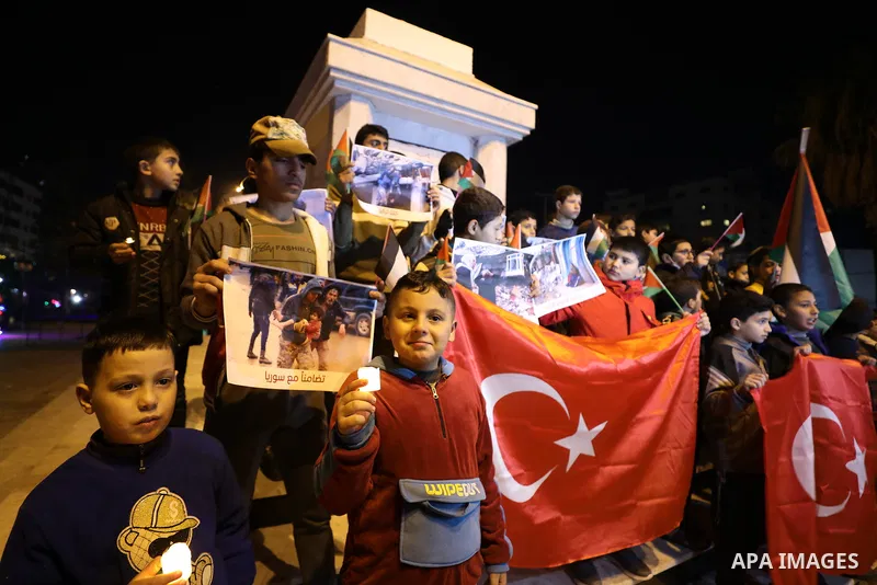 Palestinian children attend a gathering in solidarity with the people of Turkey and Syria following a devastating earthquake, in Gaza city on Feb. 09, 2023. A 7.8-magnitude earthquake hit Turkey and Syria on February 6,...
