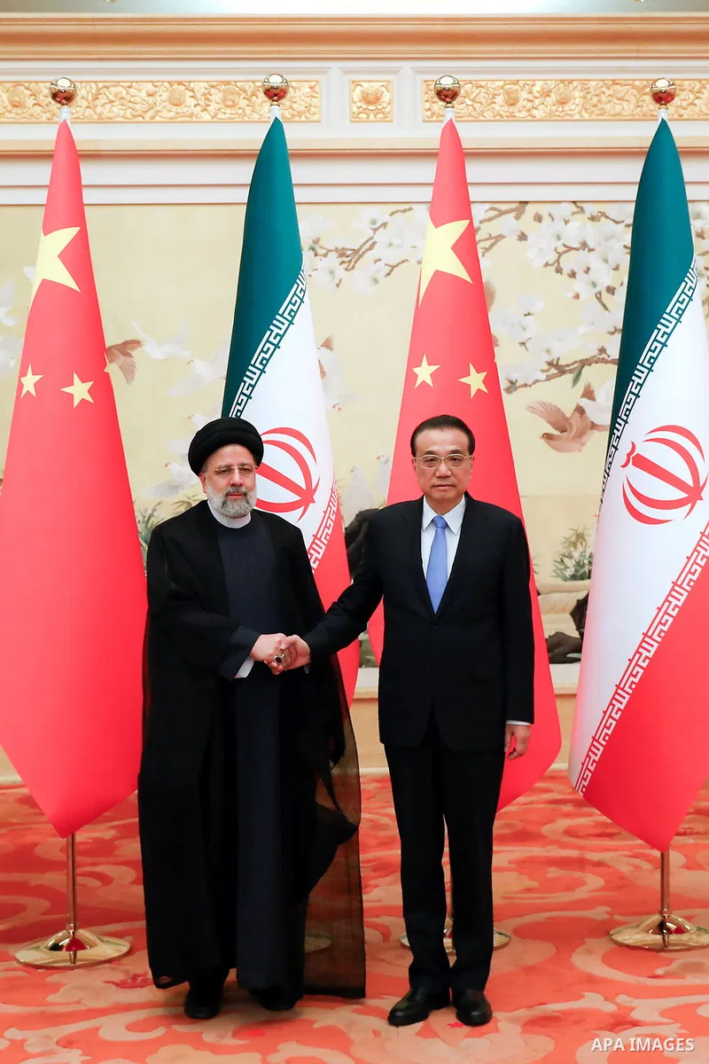 Iranian President Ebrahim Raisi meets with Prime Minister of China in Beijing on Feb. 14, 2023. Photo by Iranian Presidency Office/APAimages