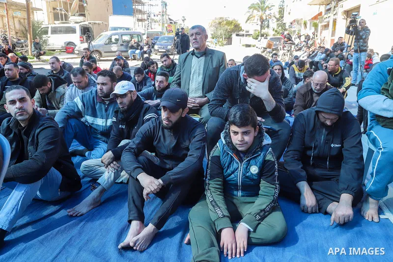 Palestinians attend Friday prayer in front of Red Cross office in solidarity with prisoners in Israeli jails, in Gaza city on Feb. 24, 2023. The head of the Palestinian Prisoner’s Society, Qaddoura Fares, today criticize...