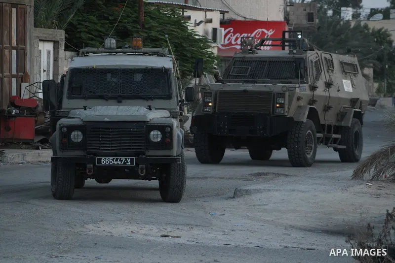 Israeli security forces conduct a military raid in the refugee camp of Aqabat Jabr in the West Bank city of Jericho on September 20, 2023. Israeli forces Wednesday morning shot and killed a Palestinian youth during a mil...