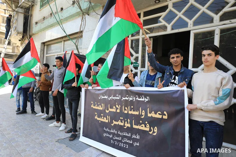 Palestinians take part in a rally in solidarity with the West Bank, in Gaza City on March 9, 2023. A special Israeli forces unit Thursday morning killed three Palestinians after opening fire at their vehicle at the entra...
