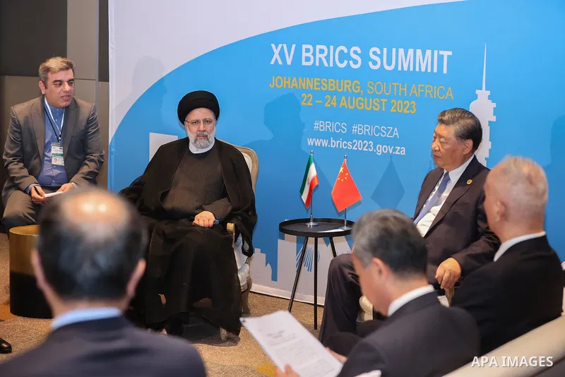 Iranian President Ebrahim Raisi meets with Chinese president in South Africa on August 24, 2023. Photo by Iranian Presidency Office