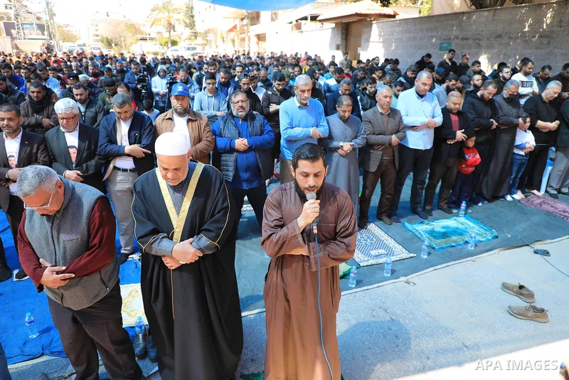 Palestinians attend Friday prayer in front of Red Cross office to support prisoners in Israeli jails, in Gaza city on March 17, 2023. Thousands of Palestinian political prisoners in Israeli prisons continue their civil d...