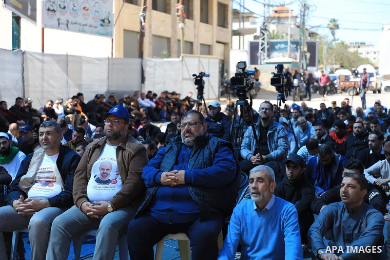 Palestinians attend Friday prayer in front of Red Cross office to support prisoners in Israeli jails, in Gaza city on March 17, 2023. Thousands of Palestinian political prisoners in Israeli prisons continue their civil d...