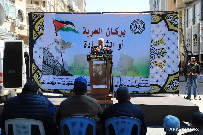 Palestinians attend Friday prayer in front of Red Cross office to support prisoners in Israeli jails, in Gaza city on March 17, 2023. Thousands of Palestinian political prisoners in Israeli prisons continue their civil d...