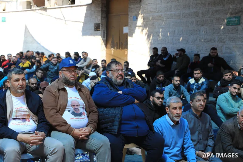 Palestinians attend Friday prayer in front of Red Cross office to support prisoners in Israeli jails, in Gaza city on March 17, 2023. Thousands of Palestinian political prisoners in Israeli prisons continue their civil d...
