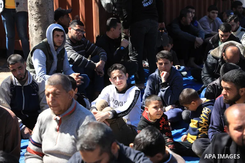Palestinians attend Friday prayer in front of Red Cross office to support prisoners in Israeli jails, in Gaza city on March 17, 2023. Thousands of Palestinian political prisoners in Israeli prisons continue their civil d...