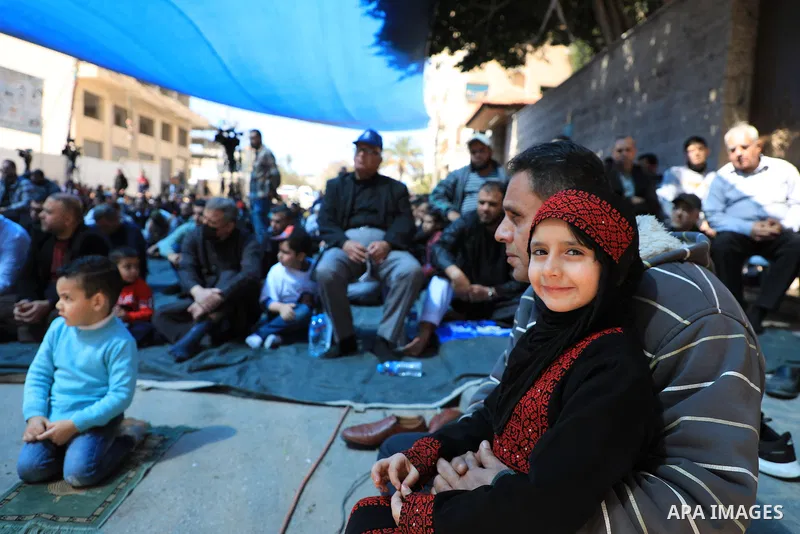 Palestinians attend Friday prayer in front of Red Cross office to support prisoners in Israeli jails, in Gaza city on March 17, 2023. Thousands of Palestinian political prisoners in Israeli prisons continue their civil d...