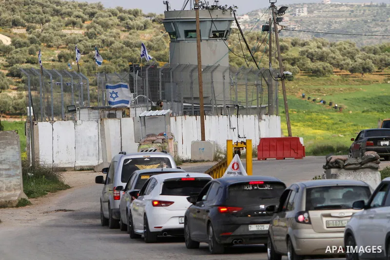 Israeli forces search Palestinian vehicles in search of Palestinian gunmen accused of shooting at Israeli army , at Israeli checkpoints in the northern West Bank on March 27, 2023. Photo by Mohammed Nasser\ apaimages