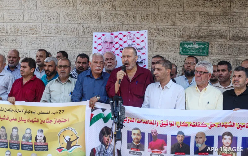 Palestinians take part in a protest to demand the return of the bodies of their slain relatives held by Israeli forces, in front of Red cross office in Gaza city on August 28, 2023. Israeli authorities have escalated the...