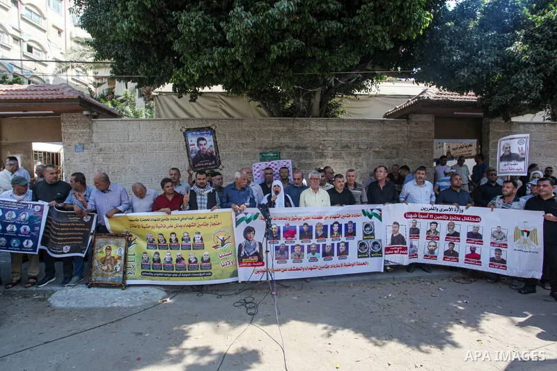 Palestinians take part in a protest to demand the return of the bodies of their slain relatives held by Israeli forces, in front of Red cross office in Gaza city on August 28, 2023. Israeli authorities have escalated the...