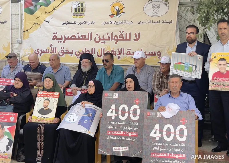 Palestinians take part in a protest to demand the return of the bodies of their slain relatives held by Israeli forces, in front of Red cross office in the West Bank city of Ramallah on August 29, 2023. Israeli authoriti...